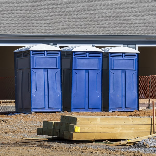 what is the cost difference between standard and deluxe porta potty rentals in Talladega AL